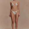 Braguita de bikini de ganchillo Huntleigh – Estampado Sunshine en blanco y dorado Braguita de bikini de ganchillo Huntleigh – Estampado Sunshine en blanco y dorado