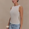 Camiseta sin mangas de punto transparente Dollie – Marfil Camiseta sin mangas de punto transparente Dollie – Marfil