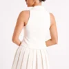 Falda plisada Mura – Marfil Falda plisada Mura – Marfil