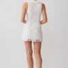 Falda Tessa Broderie Mini – Blanca Falda Tessa Broderie Mini – Blanca