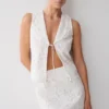 Falda Tessa Broderie Mini – Blanca Falda Tessa Broderie Mini – Blanca