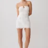 Falda Tessa Broderie Mini – Blanca Falda Tessa Broderie Mini – Blanca