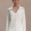 Jersey de punto con cuello en V Bianka – Blanco roto Jersey de punto con cuello en V Bianka – Blanco roto