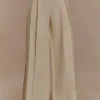 Pantalón de lino de talle medio y pierna ancha Raya – Beige natural Pantalón de lino de talle medio y pierna ancha Raya – Beige natural