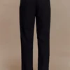 Pantalones plisados de cintura alta Penelope – Negro Pantalones plisados de cintura alta Penelope – Negro