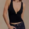 Parte de arriba ajustada Spencer con detalles metálicos – Negro Parte de arriba ajustada Spencer con detalles metálicos – Negro