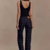 Parte de arriba ajustada Spencer con detalles metálicos – Negro Parte de arriba ajustada Spencer con detalles metálicos – Negro