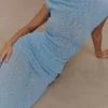 Partes de arriba de punto bouclé con hombros descubiertos de Chloe – Azul claro