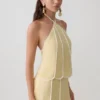 Partes de arriba sin mangas con cuello halter y paneles Georgia – Mantequilla