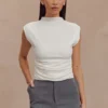 Partes de arriba sin mangas de cuello alto Ellia – Blanco Partes de arriba sin mangas de cuello alto Ellia – Blanco