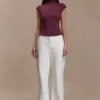 Partes de arriba sin mangas de cuello alto Freesia – Caoba