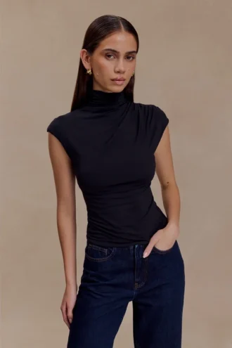Partes de arriba sin mangas de cuello alto Freesia – Negro