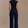 Partes de arriba sin mangas de cuello alto Freesia – Negro