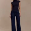 Partes de arriba sin mangas de cuello alto Freesia – Negro