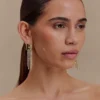 Pendientes largos con flecos de cristal Shea – Dorado Pendientes largos con flecos de cristal Shea – Dorado