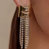 Pendientes largos con flecos de cristal Shea – Dorado Pendientes largos con flecos de cristal Shea – Dorado