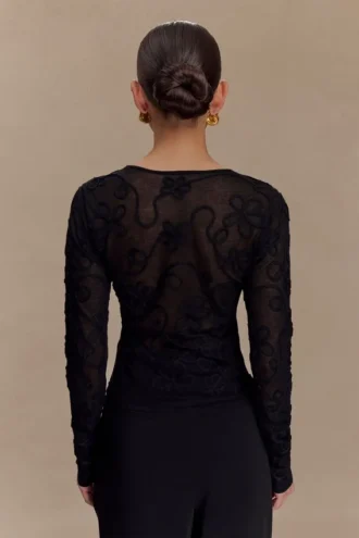 Top de punto de manga larga con bordado Omari – Negro