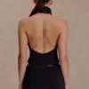 Top halter con cuello de pedrería Emilia – Negro Top halter con cuello de pedrería Emilia – Negro