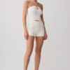 Top halter de punto Dimitri con detalles metálicos – Marfil