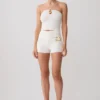 Top halter de punto Dimitri con detalles metálicos – Marfil