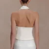 Top halter Marina con detalles metálicos – Marfil Top halter Marina con detalles metálicos – Marfil