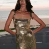 Vestido largo con aberturas y lentejuelas Adoria – Dorado Vestido largo con aberturas y lentejuelas Adoria – Dorado