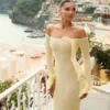 Vestido largo de punto con hombros descubiertos Sandrine – Limón Vestido largo de punto con hombros descubiertos Sandrine – Limón