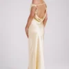 Vestido largo liso Yvette con bajo asimétrico – Mantequilla