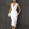 Vestido midi de algodón con cuello halter Yanina – Blanco Vestido midi de algodón con cuello halter Yanina – Blanco