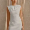 Vestido mini plisado en el cuello Ariana – Marfil Vestido mini plisado en el cuello Ariana – Marfil