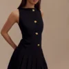 Vestido mini plisado sin mangas Mackenzie – Negro Vestido mini plisado sin mangas Mackenzie – Negro